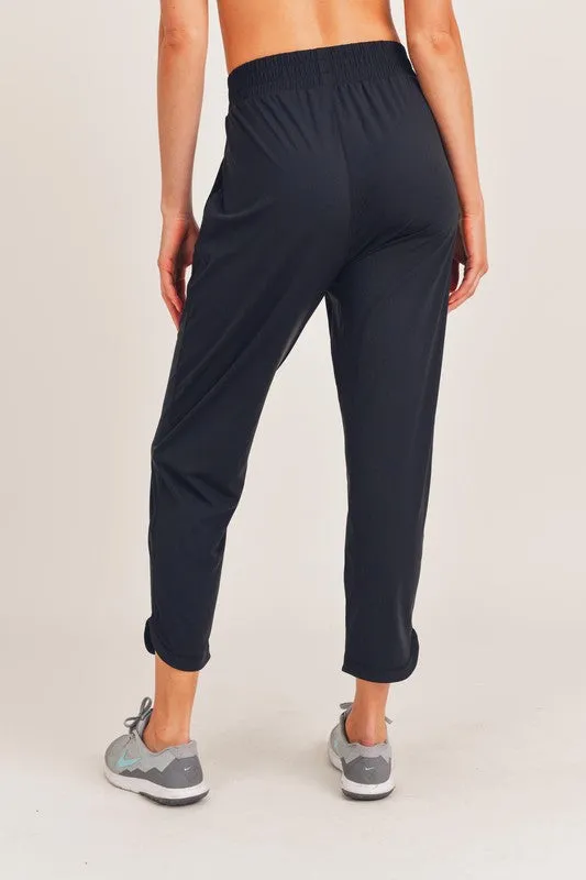 ATHLEISURE JOGGERS WITH CURVED NOTCH HEM