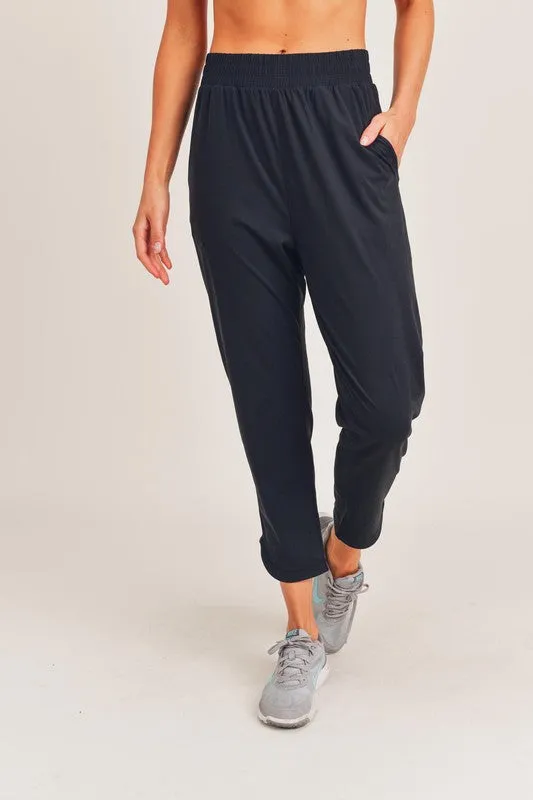 ATHLEISURE JOGGERS WITH CURVED NOTCH HEM